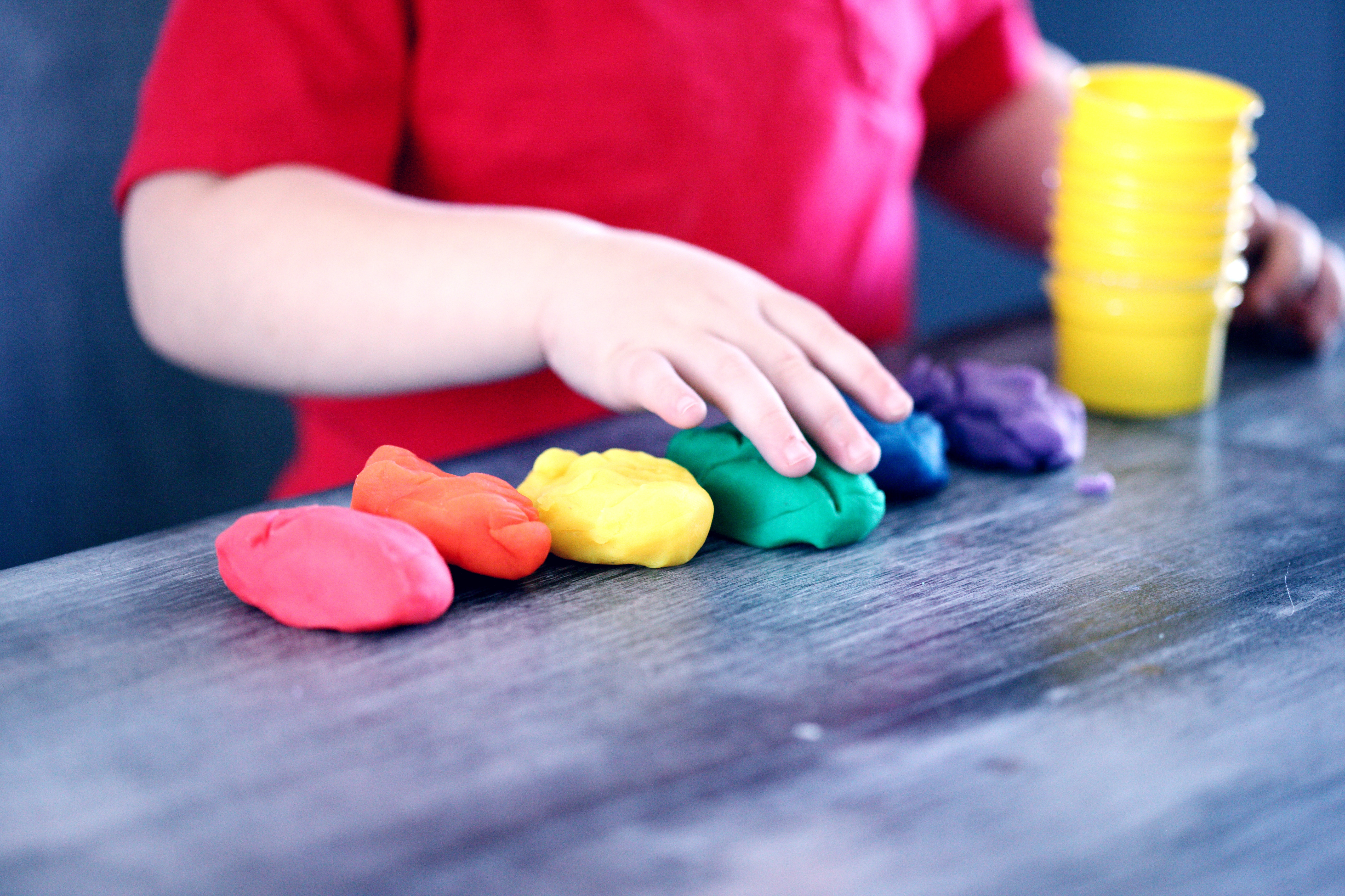 person-making-clay-figures-1449934