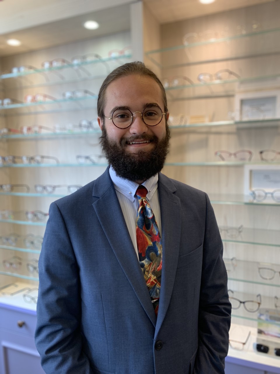 Thomas from Lynne Fernandes Optometrists, wearing glasses