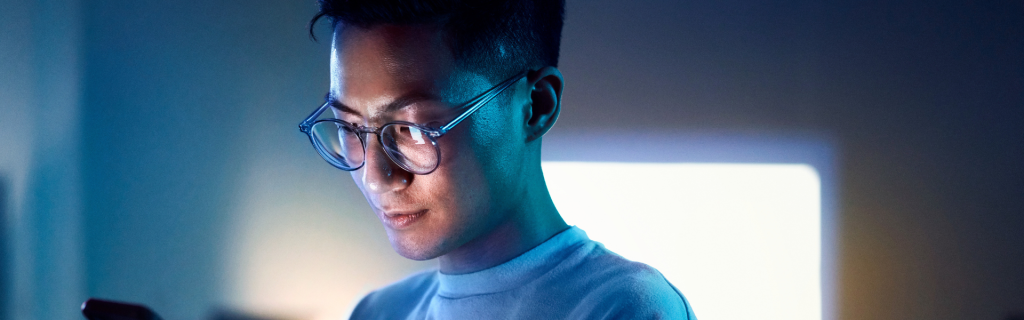 A man looking at his phone