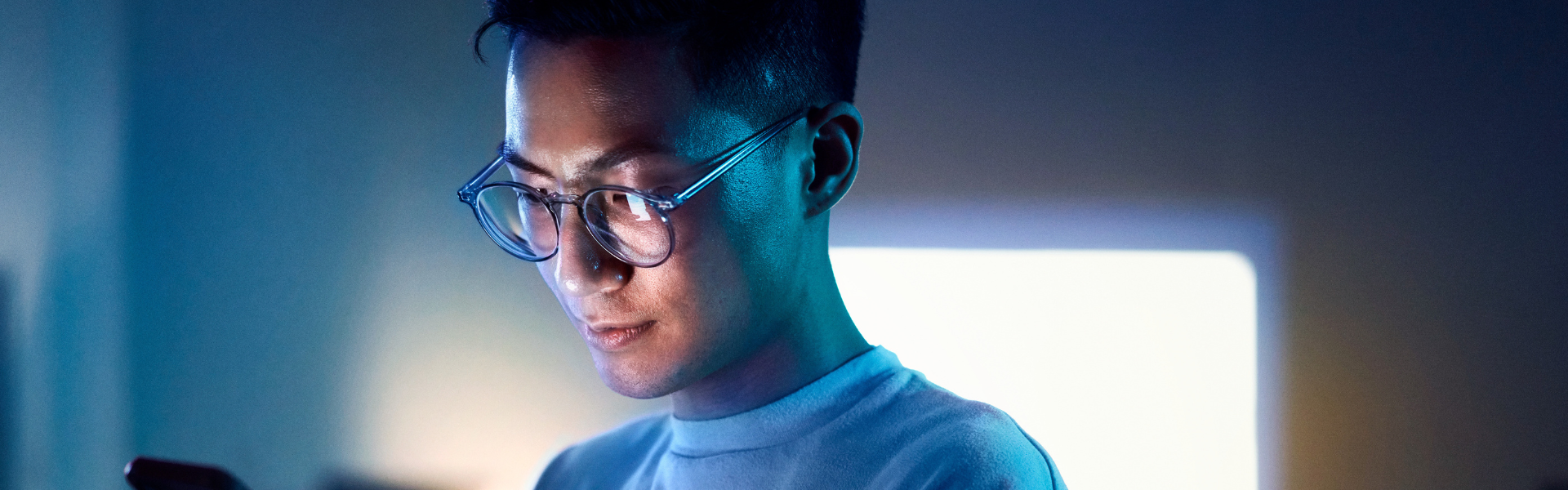 A man looking at his phone