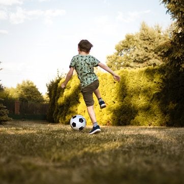 low-angle-photo-of-a-boy-playing-soccer-2682543 Boy Playing Football - Learn about Myopia Causes now